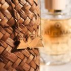 Collier dinosaure finition or salle de bain - Les Naturalistes bijoux