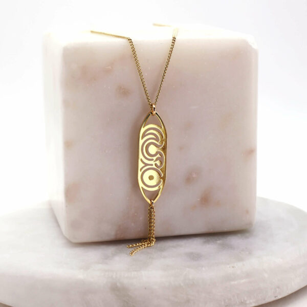 Collier Isturitz en laiton doré — collection Préhistoire — fond blanc 01, Les Naturalistes
