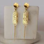 Boucles d'oreilles en laiton doré — collection Préhistoire, Les Naturalistes