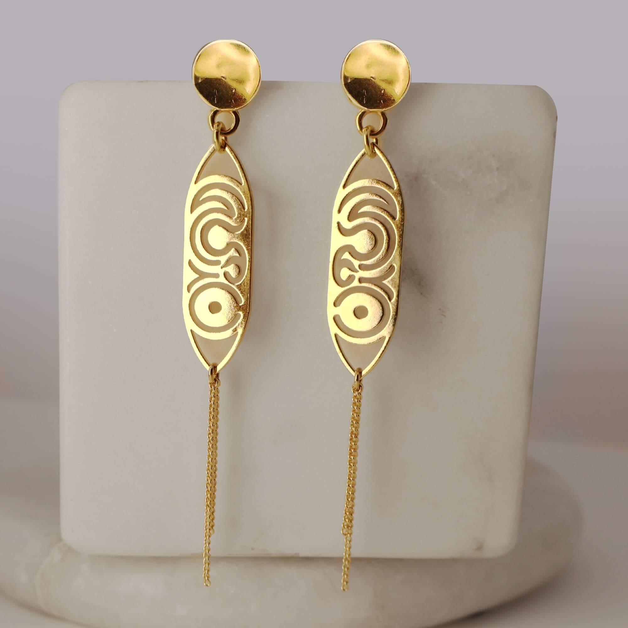 Boucles d'oreilles en laiton doré — collection Préhistoire, Les Naturalistes
